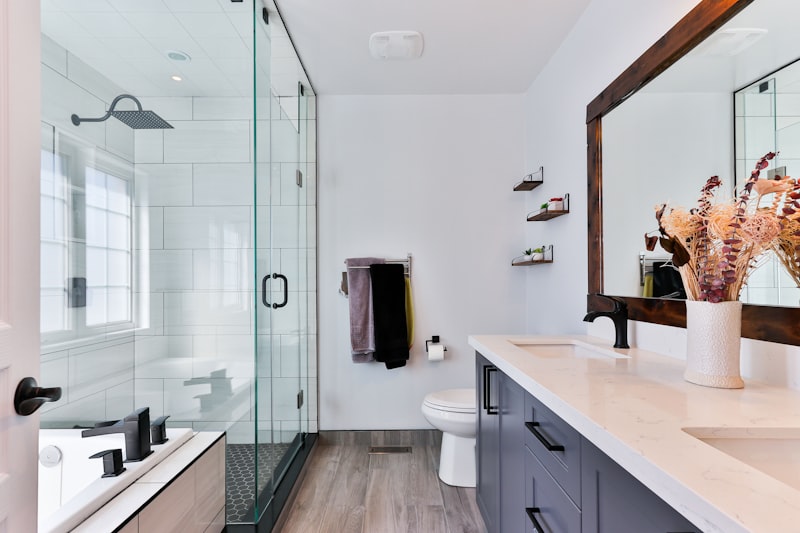 Bathroom with built-in storage solutions and organized shelving